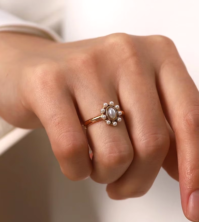 Emerald ring and vintage pearl ring options, waterproof ring.